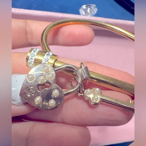 CHANEL heart and lock authentic charm on gold plated bracelet